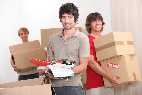 Apartment relocation planning with boxes and labels in Kingstonuponthames
