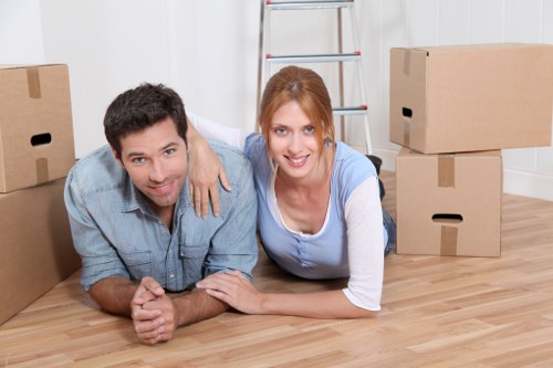 Business team preparing for office removals in Kingston upon Thames with labeled equipment