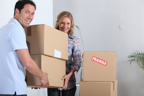 Professional movers packing boxes for a Kingston upon Thames move